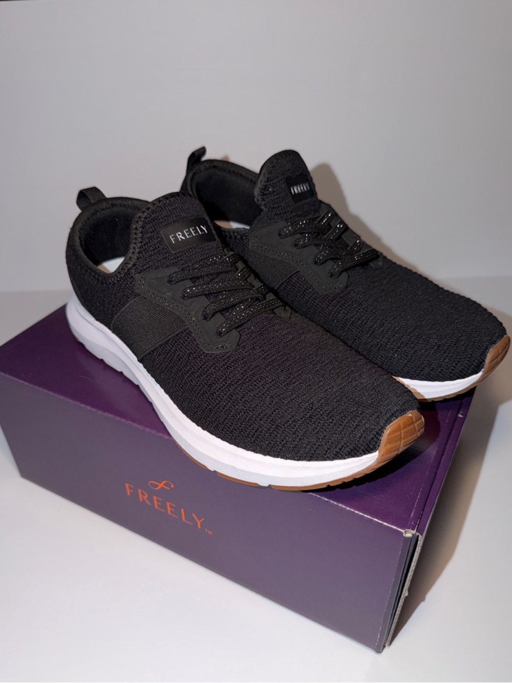 Freely Men’s Black Knit Slip-On Sneakers with Cushioned White Midsole